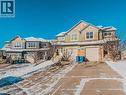 180 Panatella Way Nw, Calgary, AB  - Outdoor With Facade 
