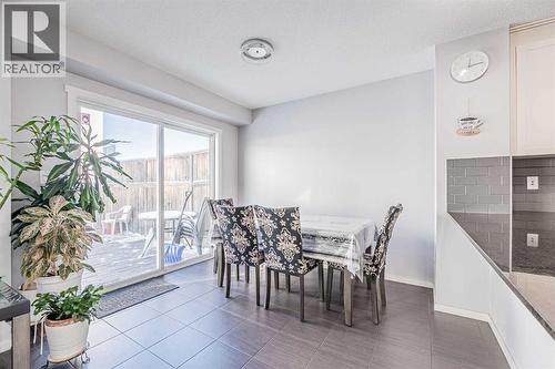 180 Panatella Way Nw, Calgary, AB - Indoor Photo Showing Dining Room