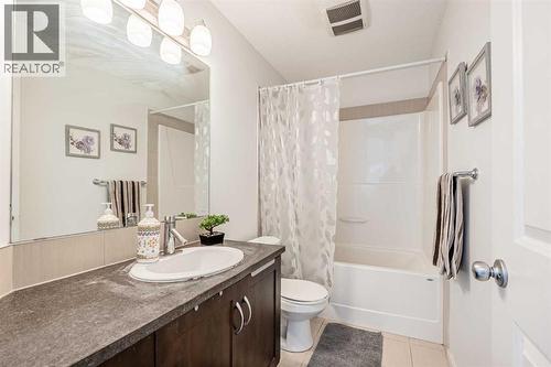 180 Panatella Way Nw, Calgary, AB - Indoor Photo Showing Bathroom