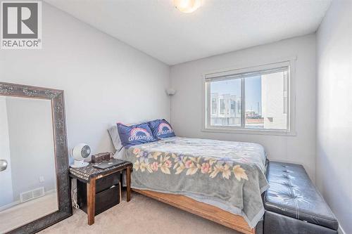 180 Panatella Way Nw, Calgary, AB - Indoor Photo Showing Bedroom