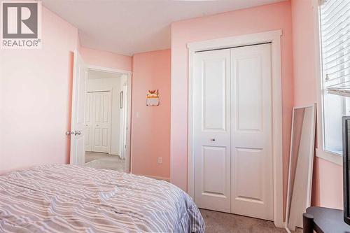 180 Panatella Way Nw, Calgary, AB - Indoor Photo Showing Bedroom