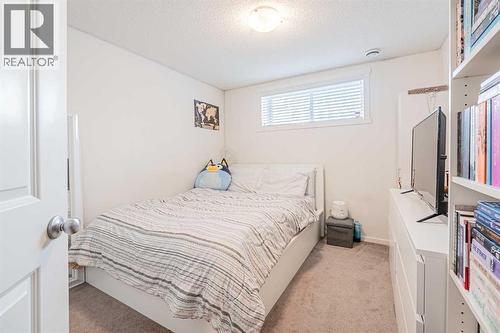 180 Panatella Way Nw, Calgary, AB - Indoor Photo Showing Bedroom