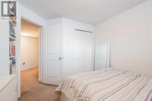 180 Panatella Way Nw, Calgary, AB - Indoor Photo Showing Bedroom
