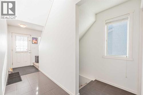 180 Panatella Way Nw, Calgary, AB - Indoor Photo Showing Other Room