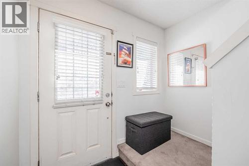 180 Panatella Way Nw, Calgary, AB - Indoor Photo Showing Other Room