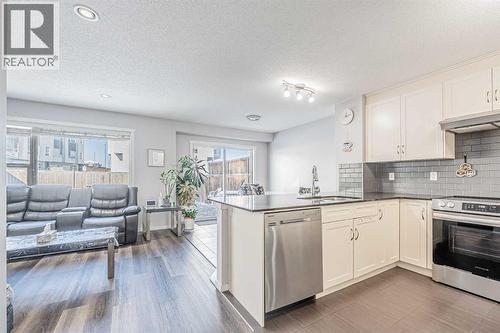 180 Panatella Way Nw, Calgary, AB - Indoor Photo Showing Kitchen With Stainless Steel Kitchen
