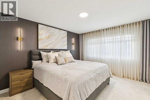 153 Edith Villas Nw, Calgary, AB - Indoor Photo Showing Bedroom