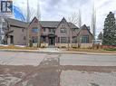 14 Rosetree Road Nw, Calgary, AB  - Outdoor With Facade 