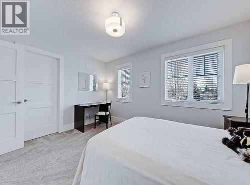 14 Rosetree Road Nw, Calgary, AB - Indoor Photo Showing Bedroom