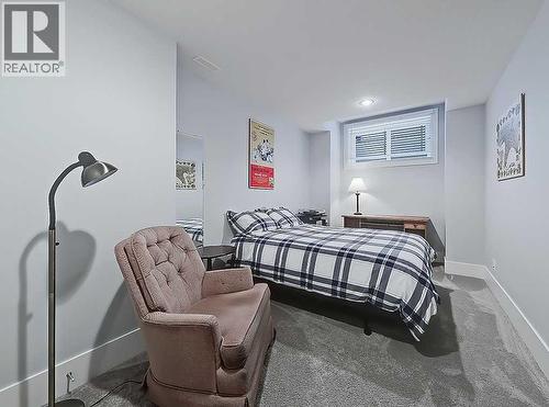14 Rosetree Road Nw, Calgary, AB - Indoor Photo Showing Bedroom