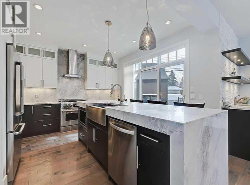 14 Rosetree Road Nw, Calgary, AB - Indoor Photo Showing Kitchen With Stainless Steel Kitchen With Upgraded Kitchen