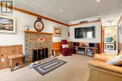 Family Room w/ Wood Burning Fireplace - 