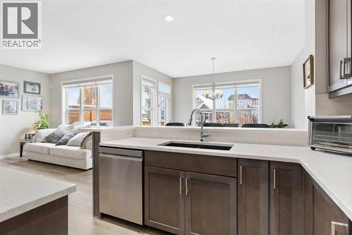 26 Marquis Heights Se, Calgary, AB - Indoor Photo Showing Kitchen With Double Sink