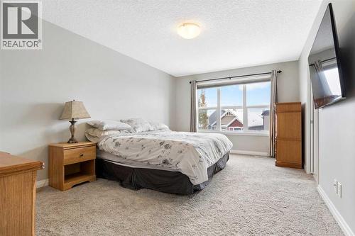 26 Marquis Heights Se, Calgary, AB - Indoor Photo Showing Bedroom