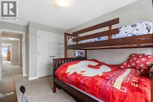 26 Marquis Heights Se, Calgary, AB - Indoor Photo Showing Bedroom