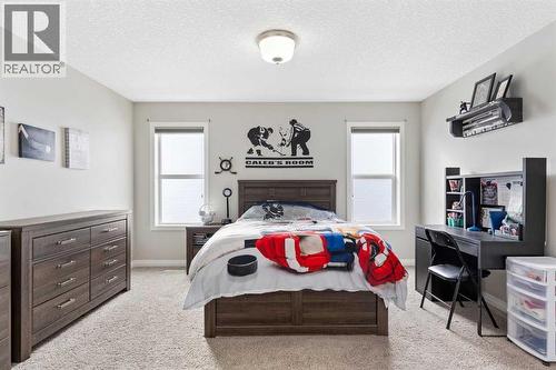 26 Marquis Heights Se, Calgary, AB - Indoor Photo Showing Bedroom