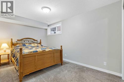 26 Marquis Heights Se, Calgary, AB - Indoor Photo Showing Bedroom