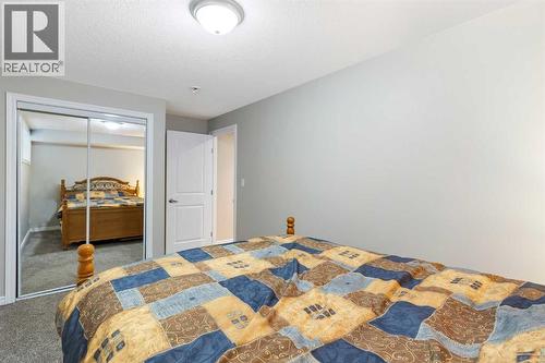 26 Marquis Heights Se, Calgary, AB - Indoor Photo Showing Bedroom