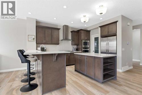 26 Marquis Heights Se, Calgary, AB - Indoor Photo Showing Kitchen With Stainless Steel Kitchen With Upgraded Kitchen