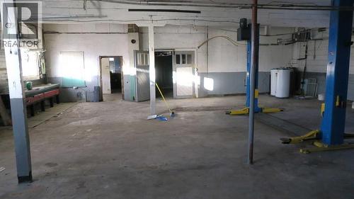 High Ceilings - 208 4 Avenue, Gleichen, AB - Indoor Photo Showing Garage