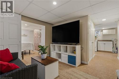 Living Room - Basement - 56 Tolton Avenue, Hamilton, ON - Indoor Photo Showing Other Room