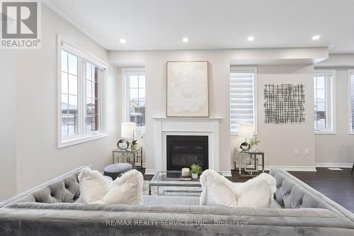 47 Dass Drive E, Centre Wellington, ON - Indoor Photo Showing Living Room With Fireplace