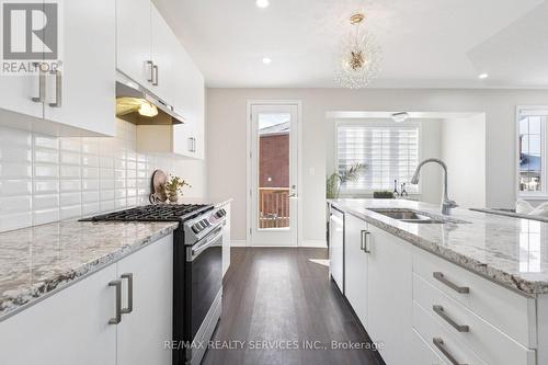 47 Dass Drive E, Centre Wellington, ON - Indoor Photo Showing Kitchen With Double Sink With Upgraded Kitchen
