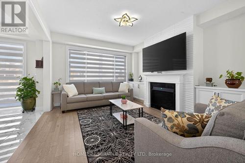 12 Rainbow Drive, Haldimand, ON - Indoor Photo Showing Living Room With Fireplace