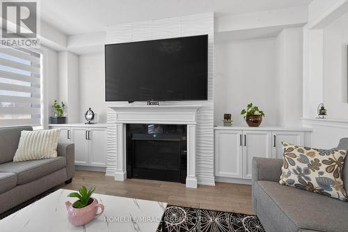 12 Rainbow Drive, Haldimand, ON - Indoor Photo Showing Living Room With Fireplace