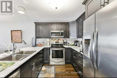 100 Spruce Gardens Court, Belleville, ON - Indoor Photo Showing Kitchen With Double Sink With Upgraded Kitchen