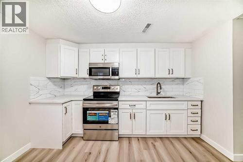 937 Marcombe Drive Ne, Calgary, AB - Indoor Photo Showing Kitchen