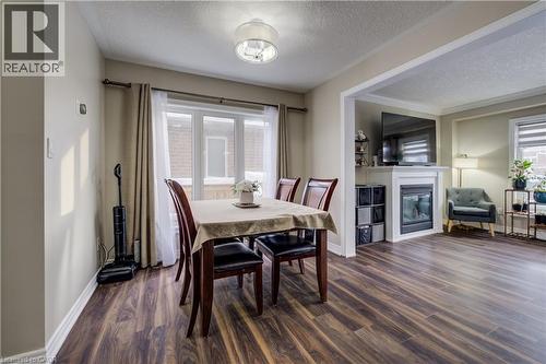 1444 Dunkirk Avenue, Woodstock, ON - Indoor Photo Showing Dining Room With Fireplace
