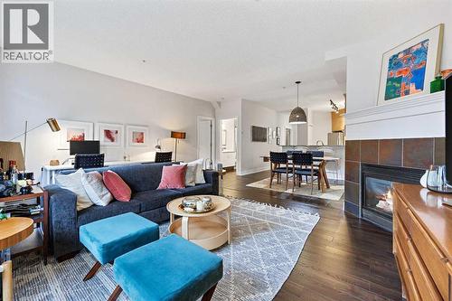 304, 923 15 Avenue Sw, Calgary, AB - Indoor Photo Showing Living Room With Fireplace