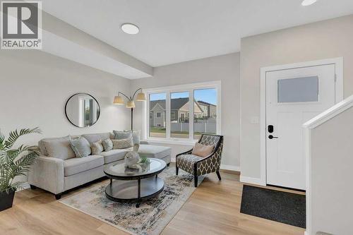 13 Gray Close, Sylvan Lake, AB - Indoor Photo Showing Living Room