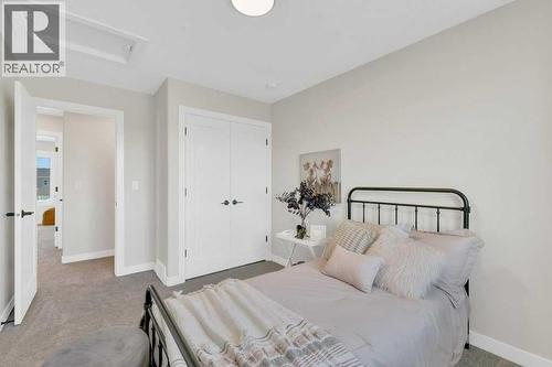 13 Gray Close, Sylvan Lake, AB - Indoor Photo Showing Bedroom