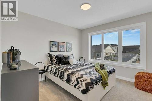 13 Gray Close, Sylvan Lake, AB - Indoor Photo Showing Bedroom