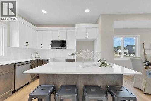 13 Gray Close, Sylvan Lake, AB - Indoor Photo Showing Kitchen With Upgraded Kitchen