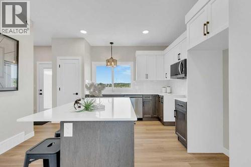 13 Gray Close, Sylvan Lake, AB - Indoor Photo Showing Kitchen With Upgraded Kitchen