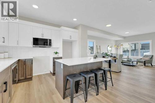 13 Gray Close, Sylvan Lake, AB - Indoor Photo Showing Kitchen With Upgraded Kitchen