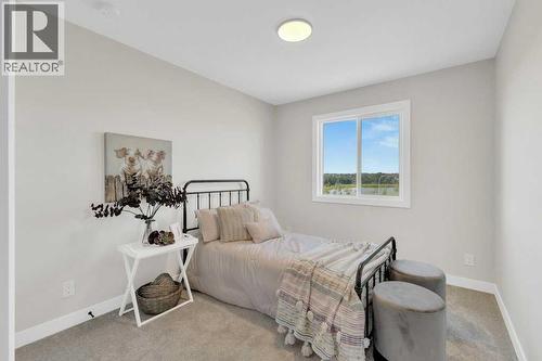 13 Gray Close, Sylvan Lake, AB - Indoor Photo Showing Bedroom