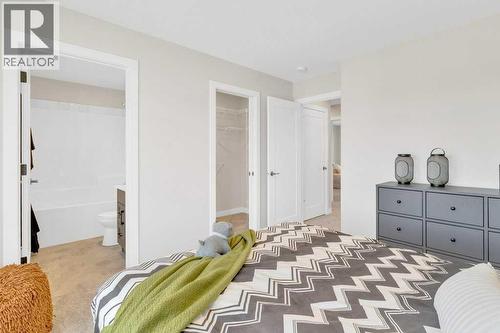 13 Gray Close, Sylvan Lake, AB - Indoor Photo Showing Bedroom