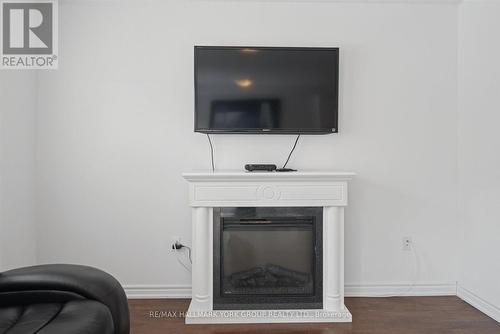 70 - 50 Southwoods Crescent, Barrie, ON - Indoor Photo Showing Living Room With Fireplace