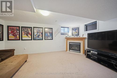 70 - 50 Southwoods Crescent, Barrie, ON - Indoor Photo Showing Other Room With Fireplace