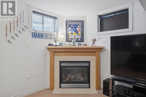 70 - 50 Southwoods Crescent, Barrie, ON - Indoor Photo Showing Living Room With Fireplace