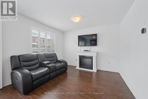 70 - 50 Southwoods Crescent, Barrie, ON - Indoor Photo Showing Living Room With Fireplace