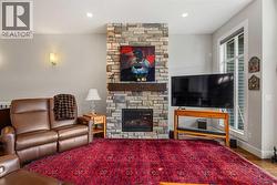 The gas fireplace provides a cozy, focal point - 