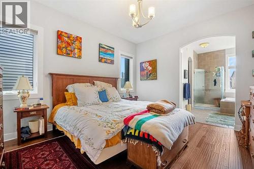 Enter into your primary bedroom - 2253 Bayside Road Sw, Airdrie, AB - Indoor Photo Showing Bedroom