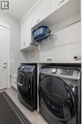 MAIN FLOOR LAUNDRY - 2253 Bayside Road Sw, Airdrie, AB - Indoor Photo Showing Laundry Room