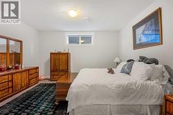 Another guest bedroom locatedin the basement - 