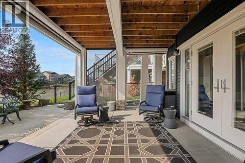 Enjoy sun coast screens down here as well! - 2253 Bayside Road Sw, Airdrie, AB - Outdoor With Deck Patio Veranda With Exterior